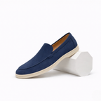 Men's slip-on loafers with moc toe detailing and flat sole