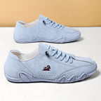 Low-profile lace-up trainers with rounded toes, stitched panels and textured soles