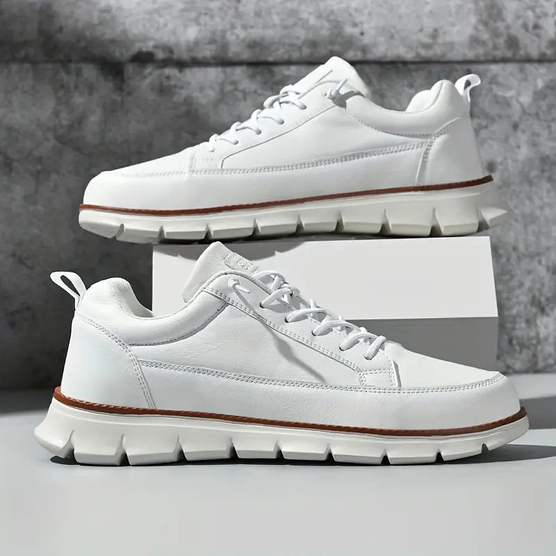 Low top lace-up sneaker with stitched panels and chunky textured sole