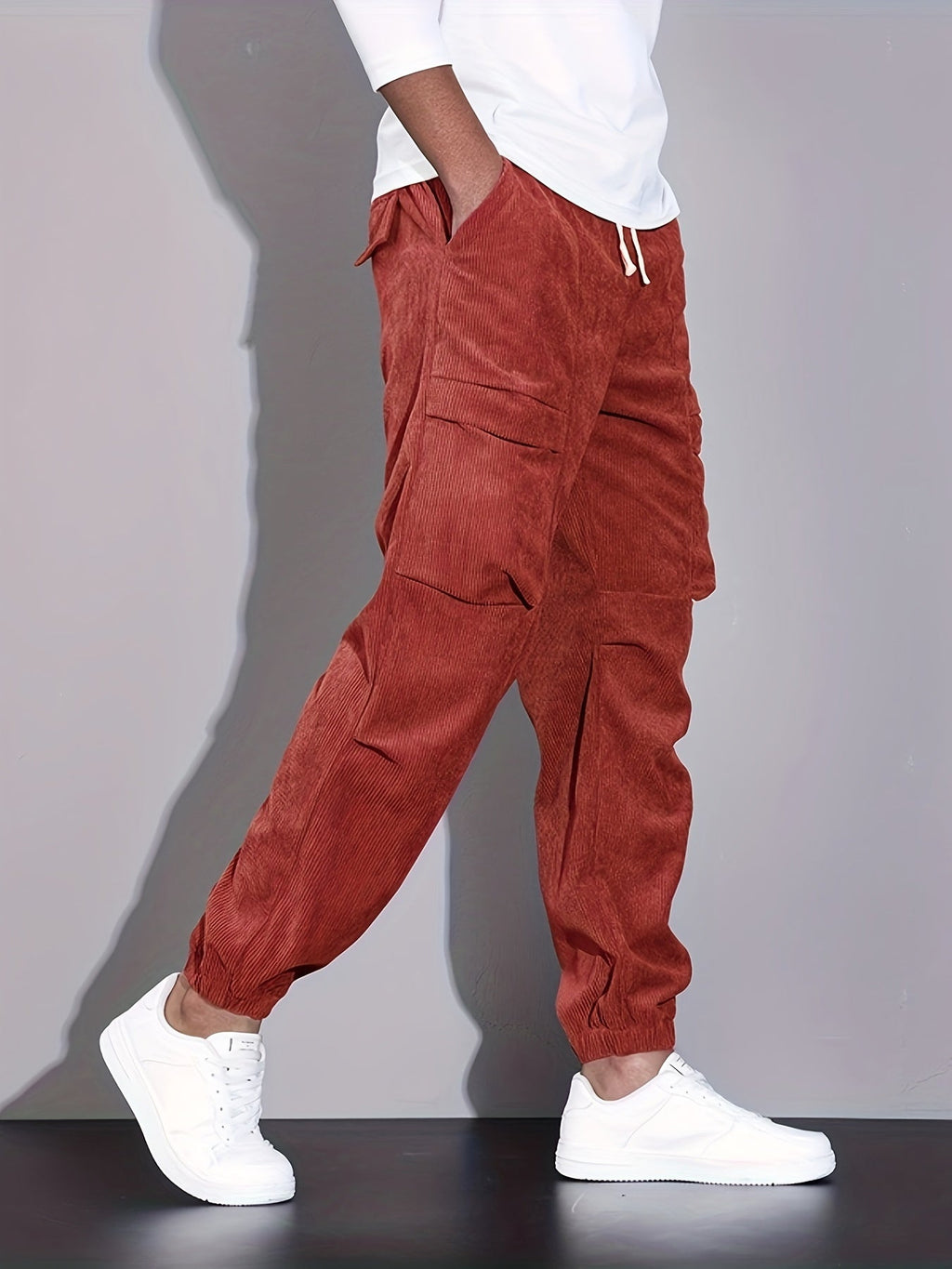 Men's corduroy cargo trousers with drawstring waist and cuffed hems