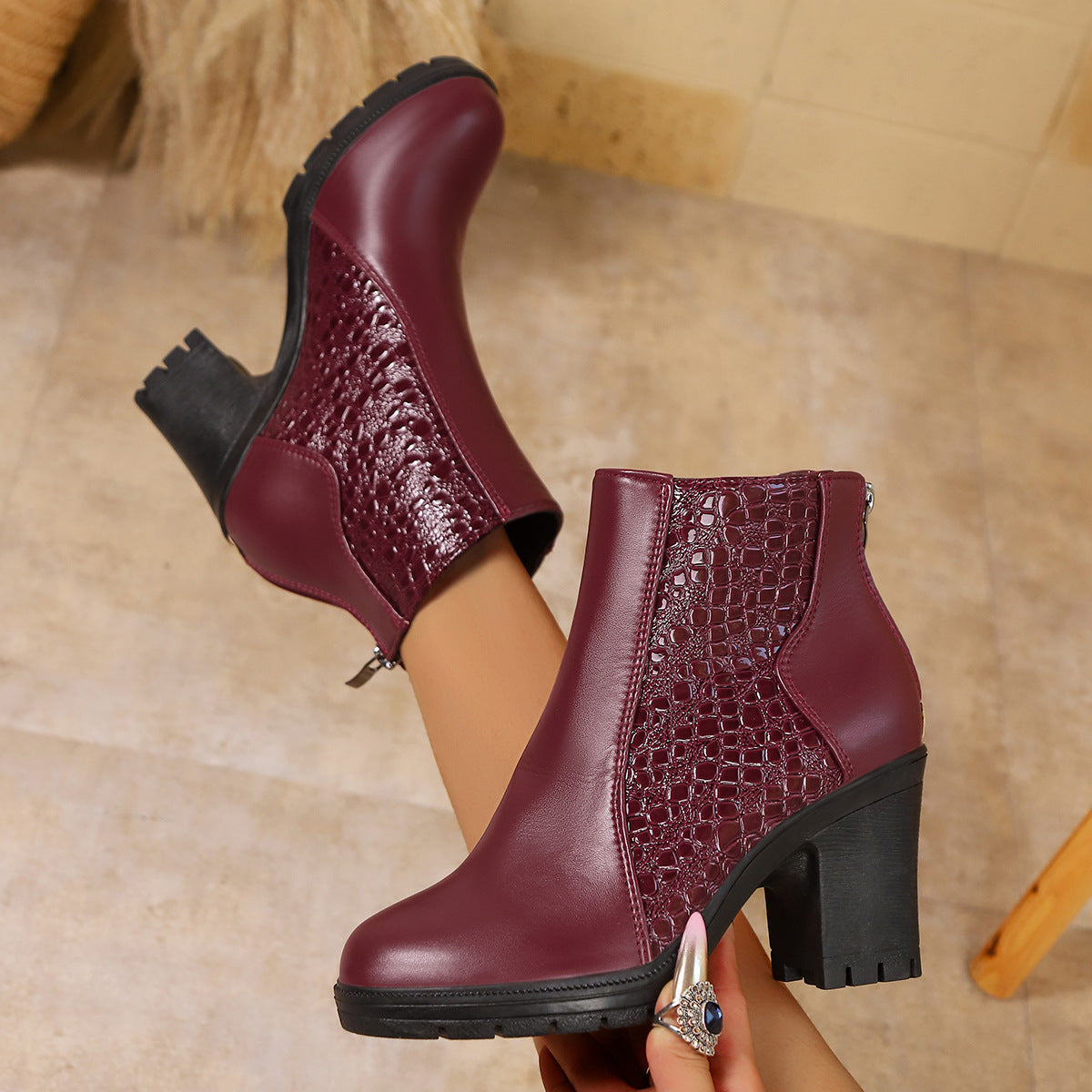 Women's ankle boots with textured panels, high block heels, side zips and lugged soles