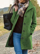 Women's textured mid-length coat with lapel collar and button front