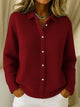 Women's ribbed button cardigan with collared neckline and long sleeves