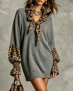 Women's grey sweater mini dress with leopard print scarf collar and cuffs