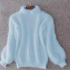 Women's fluffy turtleneck sweater with long sleeves and ribbed trims