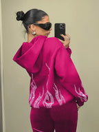 Women's hooded sweatshirt with rhinestone flame detailing on the back and sleeves
