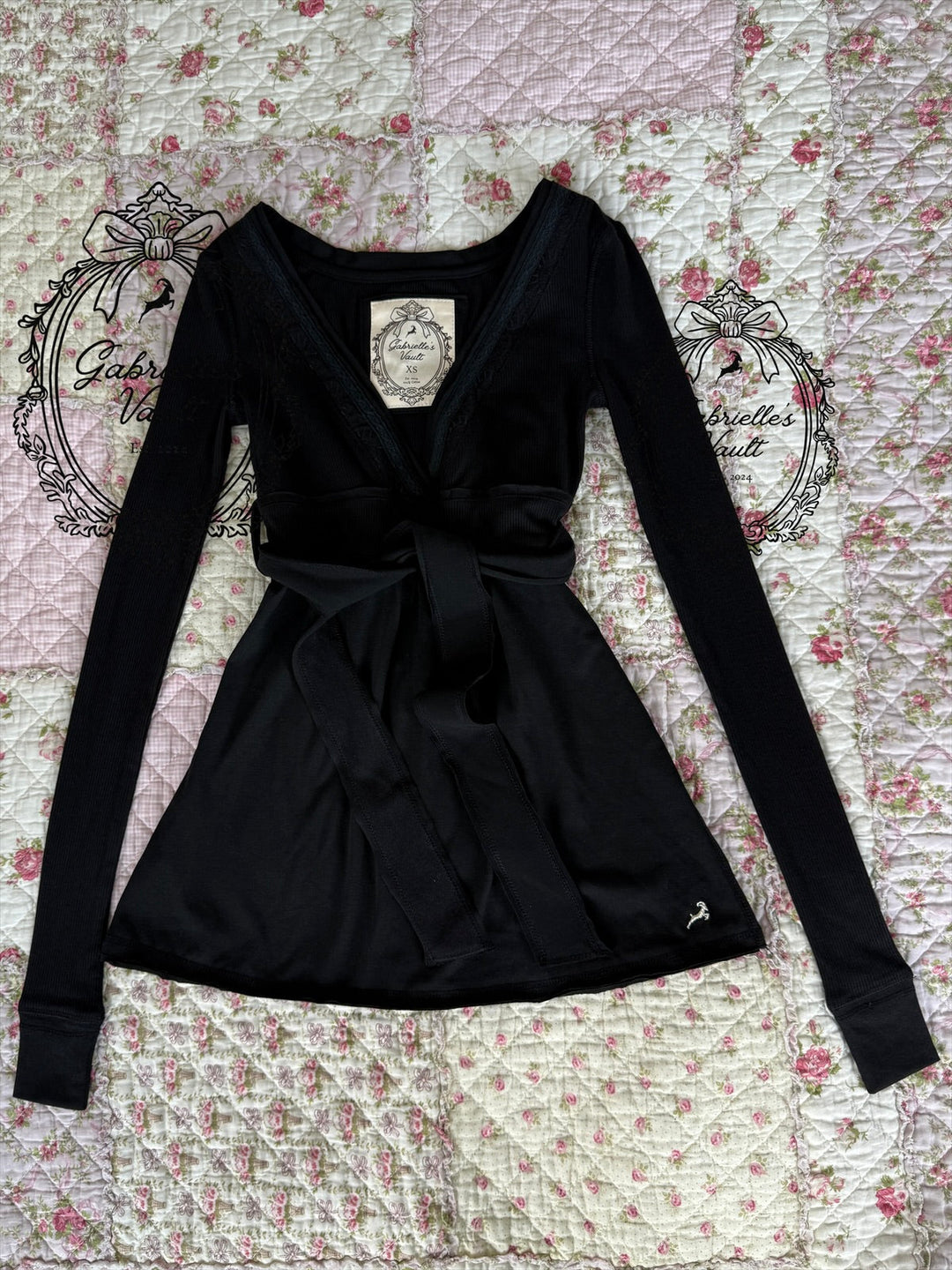 Women's wrap babydoll top with V-neck and tie waist