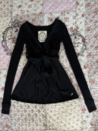 Women's wrap babydoll top with long sleeves and waist ties