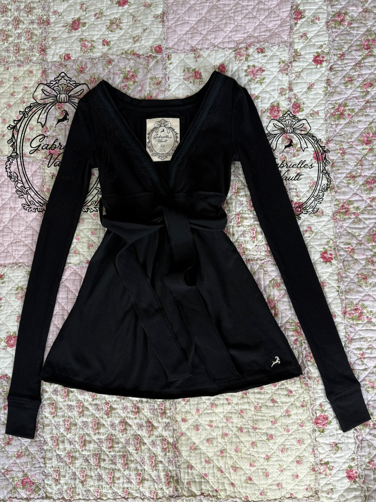 Women's wrap babydoll top with long sleeves and waist ties