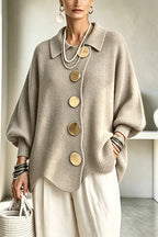 Women's oversized ribbed cardigan with collared neckline, balloon sleeves and large front buttons