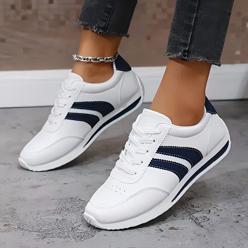 Women's white lace-up sneakers with dark side stripes