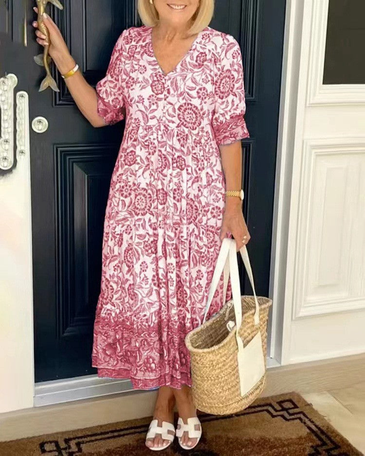 Women's floral V-neck midi dress with three-quarter sleeves