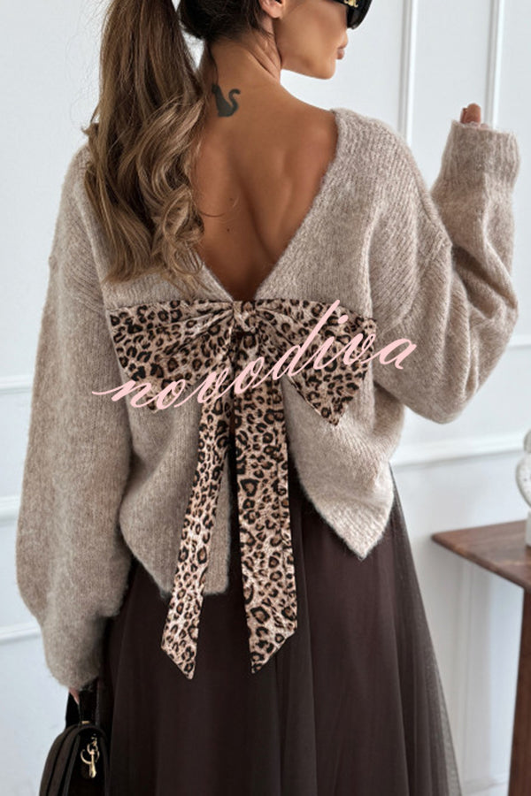 Women's relaxed jumper with leopard print bow and deep V-back