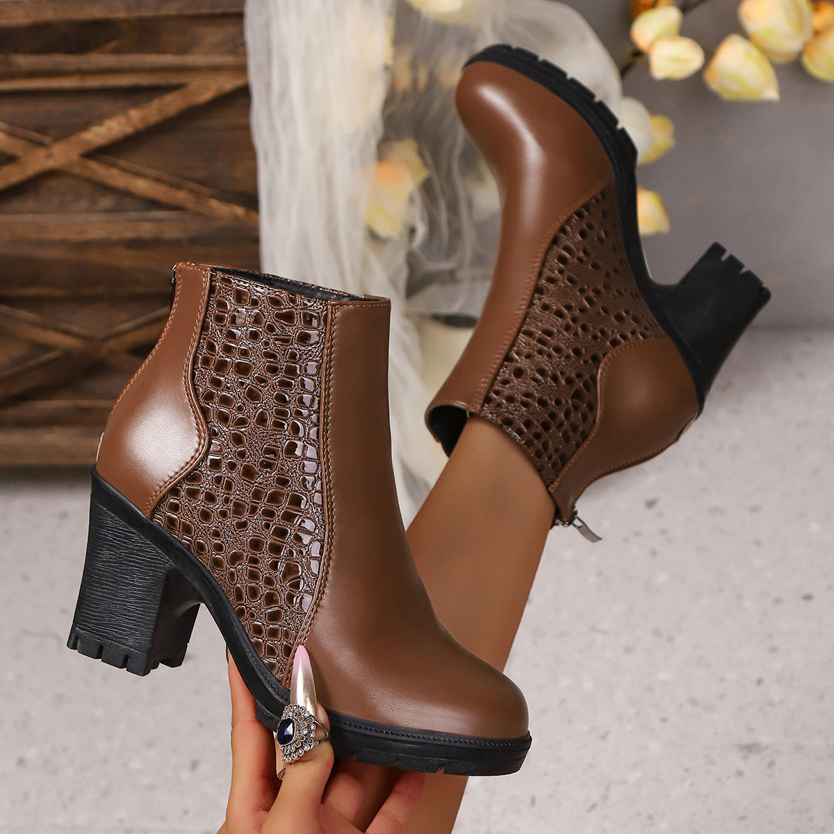 Women's ankle boots with textured panels, high block heels, side zips and lugged soles