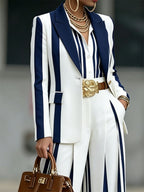 Women's navy and white striped blazer with notched lapels and long sleeves