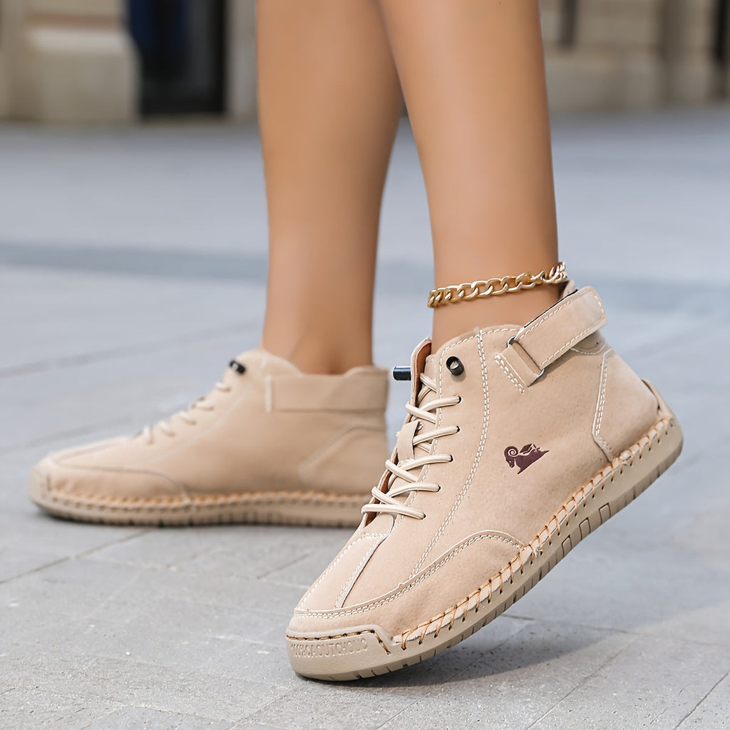 Ankle-height lace-up sneakers with stitched panels, ankle straps and contrast soles