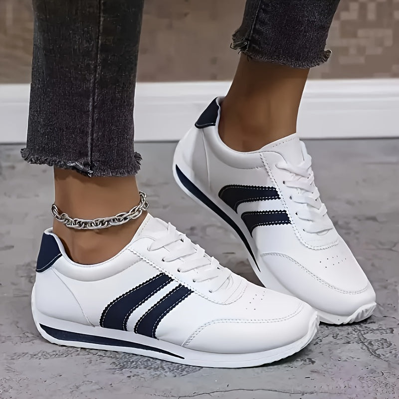 Women's white lace-up sneakers with dark side stripes