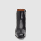 Black women's ankle boot with round toe and side zipper