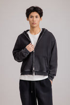 Men's black zip-up hoodie jacket with front pockets and vintage finish