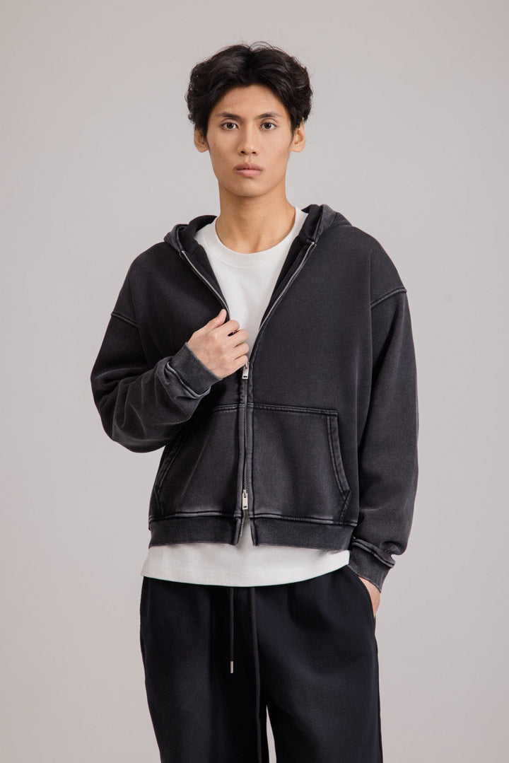Men's black zip-up hoodie jacket with front pockets and vintage finish