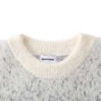 Unisex knitted sweater with crew neck, long sleeves and abstract contrast motif