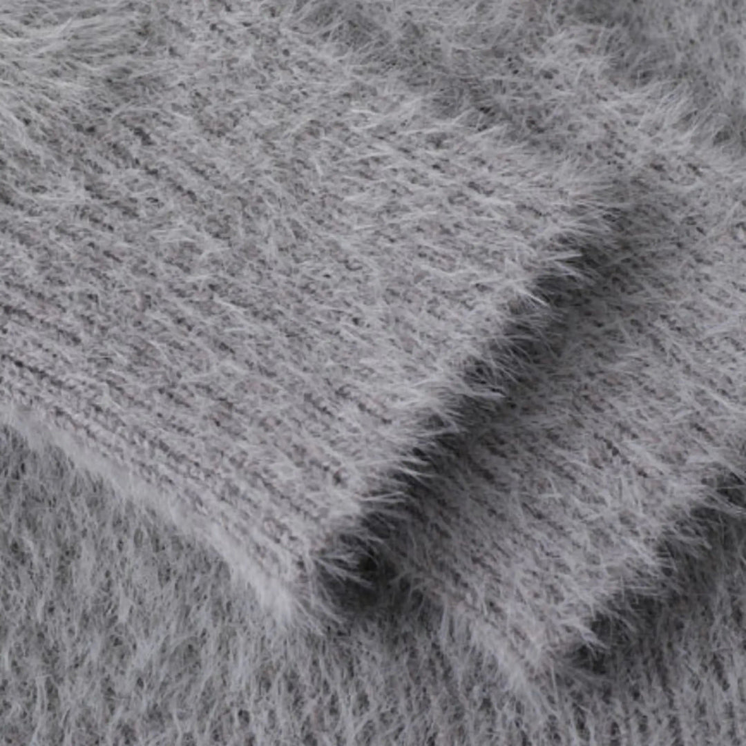 Unisex knitted sweater with crew neck, long sleeves and abstract contrast motif