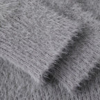 Unisex knitted sweater with crew neck, long sleeves and abstract contrast motif