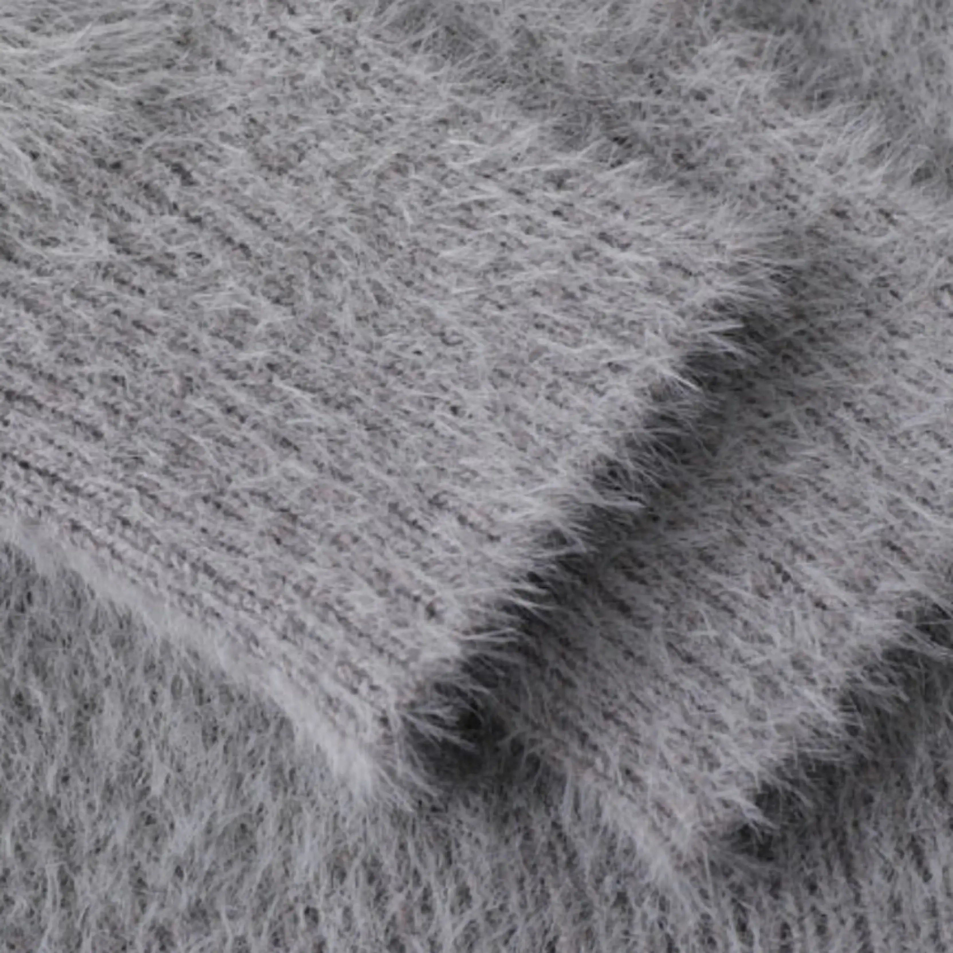 Unisex knitted sweater with crew neck, long sleeves and abstract contrast motif