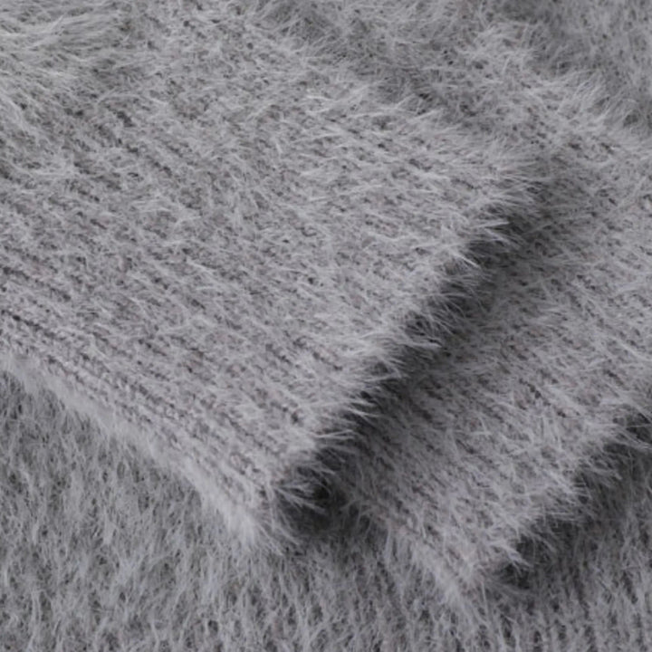 Unisex knitted sweater with crew neck, long sleeves and abstract contrast motif