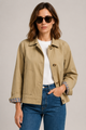 Women's beige short trench jacket with button front and checked turn-back cuffs