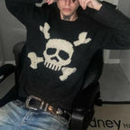 Men's black sweater with a cream skull and crossed-bones graphic