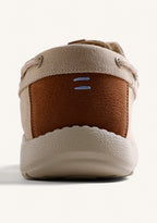 Beige canvas Wallabee loafers with lace-up fronts and moc toes