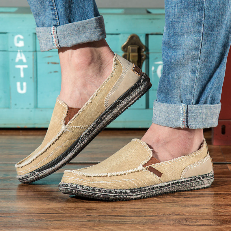 Unisex canvas loafer with moc toe, contrast stitching and flat sole