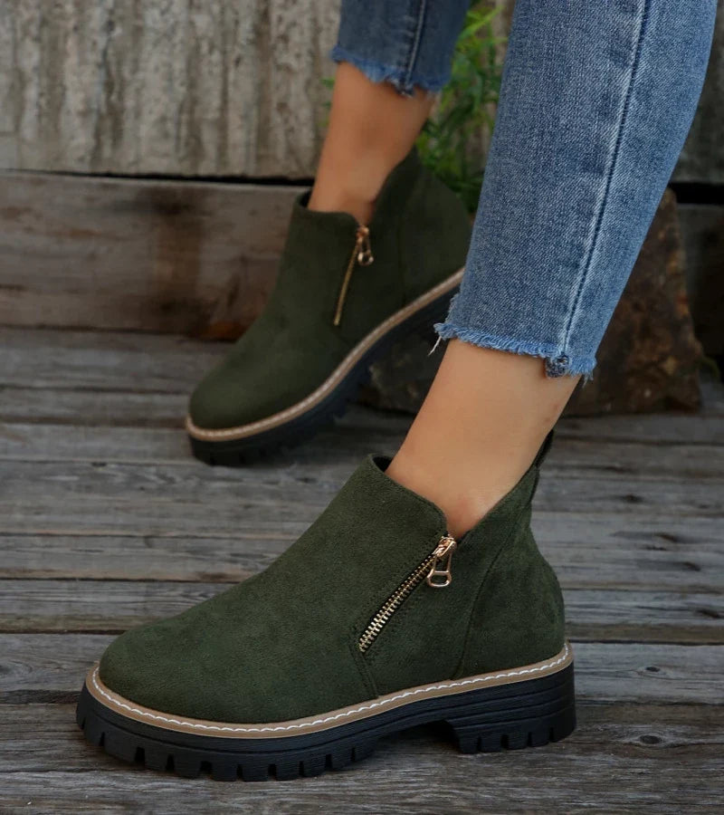 Women's ankle boots with side zips, rounded toes and chunky lug soles