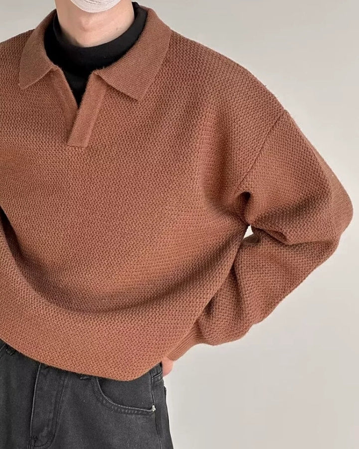 Men's textured knit polo sweater with open V-neck collar and long sleeves
