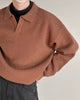 Men's textured knit polo sweater with open V-neck collar and long sleeves