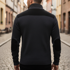 Men's half-zip sweater with stand collar, contrast shoulder panels and chest pocket