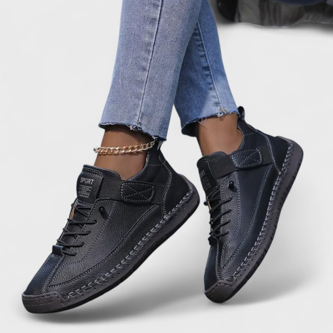 Women's lace-up casual sneakers with ankle strap, stitched panels and textured sole