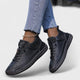 Women's lace-up casual sneakers with ankle strap, stitched panels and textured sole