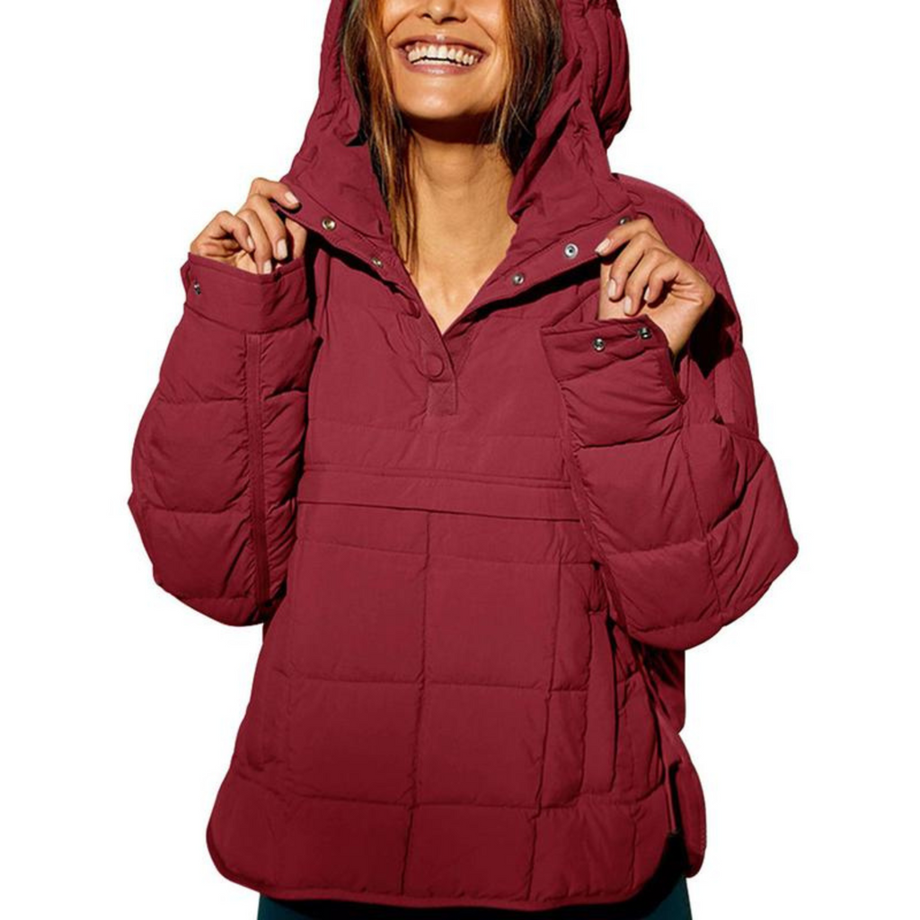 Women's oversized hooded quilted pullover jacket with long sleeves and front pockets