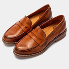 Men's penny loafers with rounded toes, stitched trim and low heels