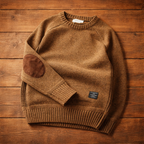 Women's crew-neck knit sweater with raglan sleeves and elbow patches