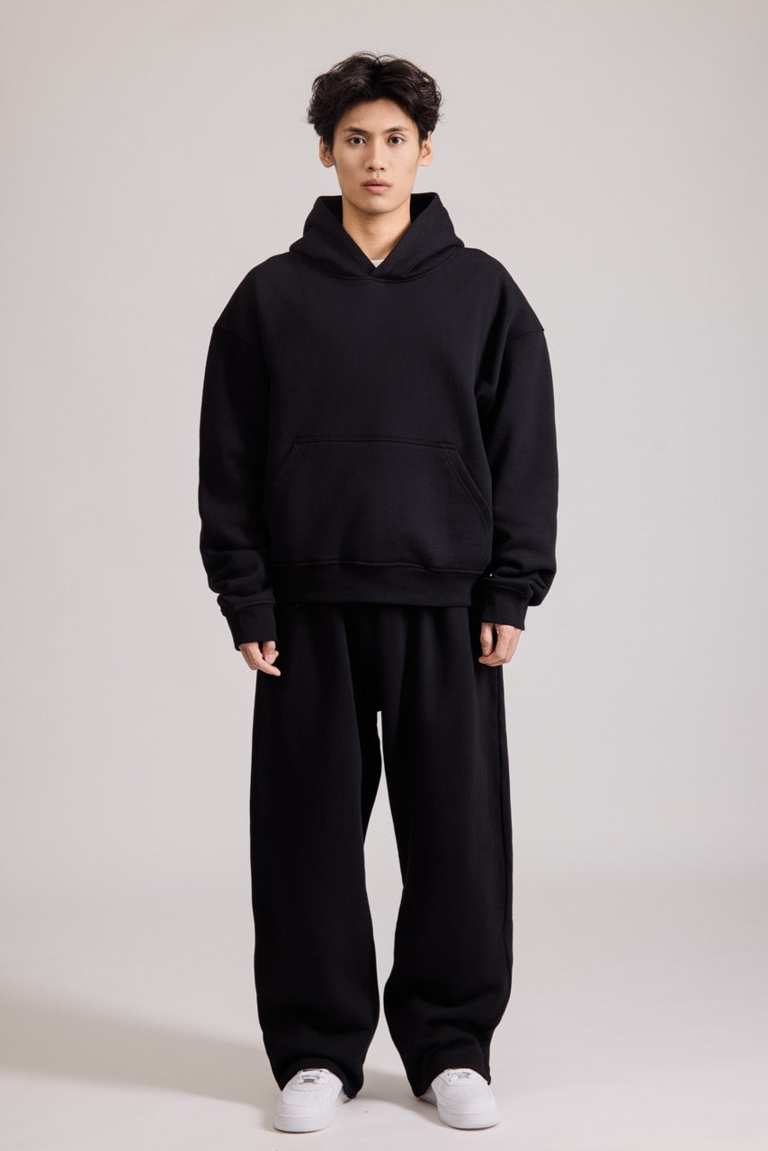 Men's black pullover hoodie with hood and front pouch pocket