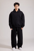 Men's black pullover hoodie with hood and front pouch pocket