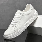 Classic low-top lace-up sneakers with textured upper and contrasting sole