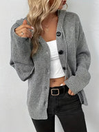 Women's hooded knitted cardigan with button front, long sleeves and ribbed cuffs