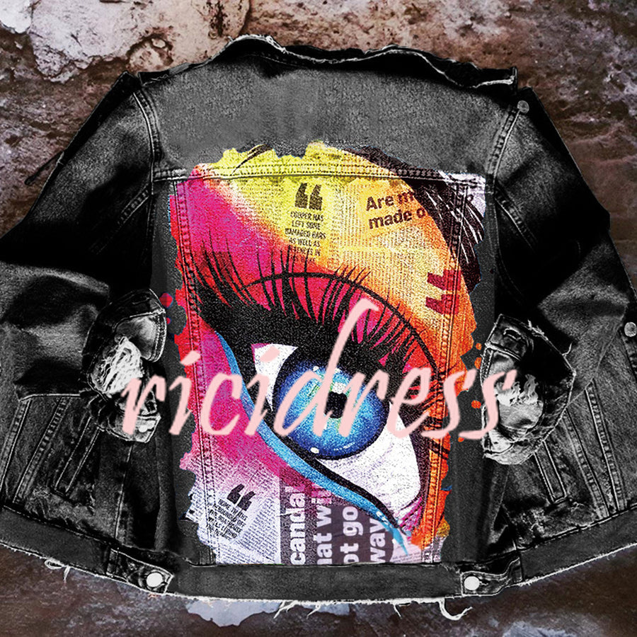 Women's denim jacket with colourful graphic eye print on the back