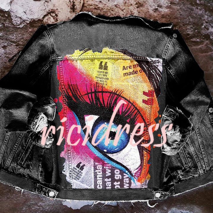 Women's denim jacket with colourful graphic eye print on the back