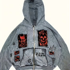 Men's grey zip-up hoodie with hood, graphic patches and front pockets