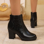 Women's ankle boots with textured panels, high block heels, side zips and lugged soles